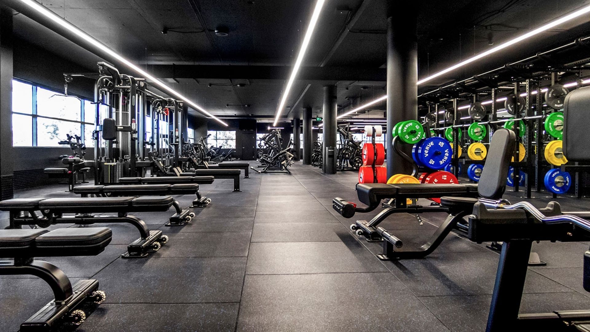 Wide view across the weights floor
