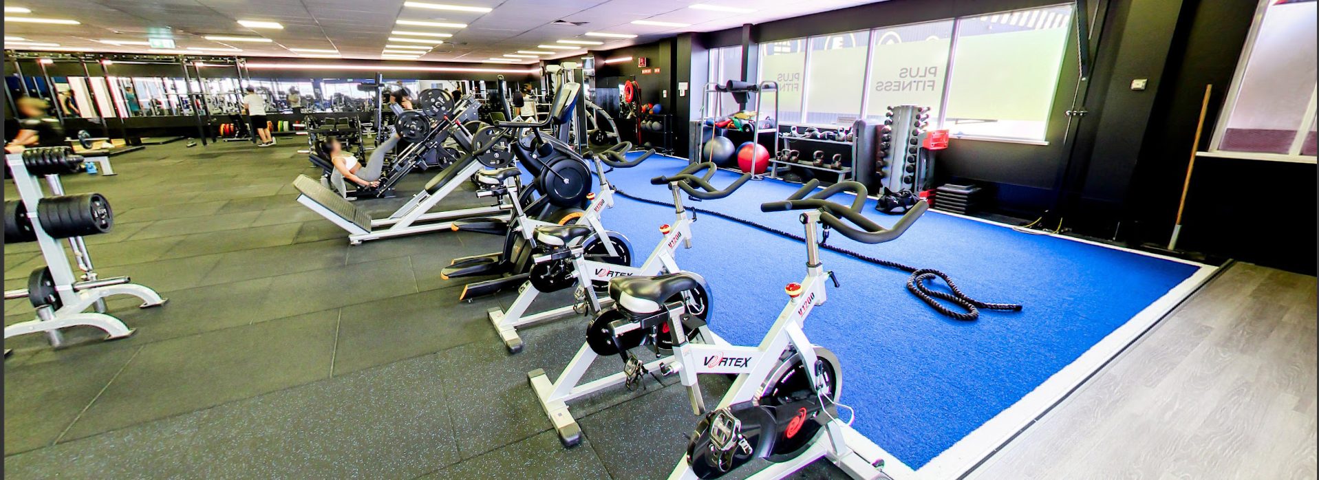 The blue turf strip at Bankstown with spin bikes alongside