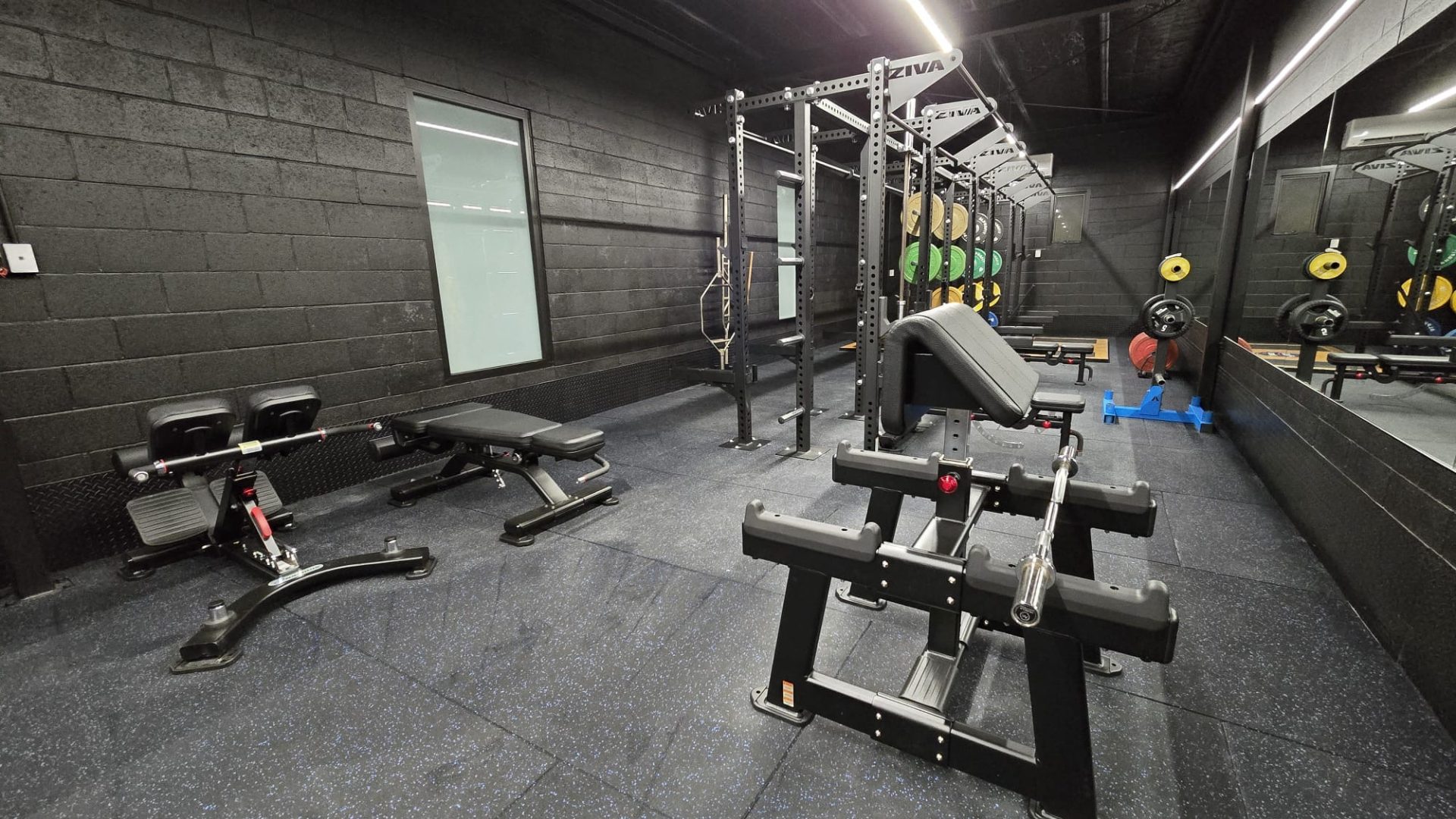 Bench and rack area with mirrors